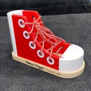 Melissa And Doug how to tie your shoe lace!